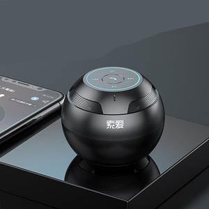 Bluetooth Speaker Mini playing music outdoors